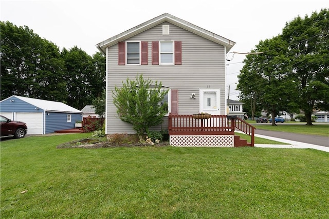 11 Fulton St, North Dansville, NY 14437 - traditional-style home with a garage, a front yard, and an outdoor structure