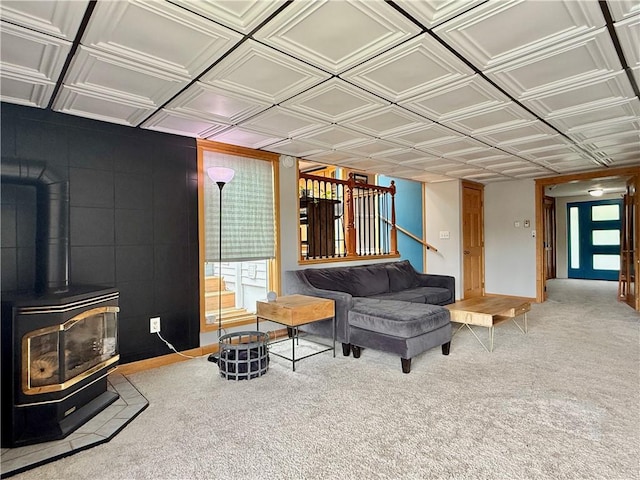 3 Suncrest Ter, Oneonta-City, NY 13820 - carpeted living area with an ornate ceiling and a wood stove