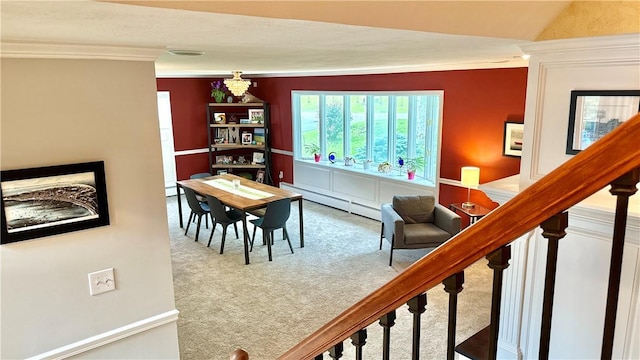 3 Suncrest Ter, Oneonta-City, NY 13820 - dining space with carpet floors, a baseboard radiator, crown molding, stairs, and baseboard heating