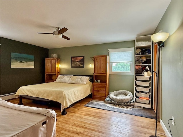 3 Suncrest Ter, Oneonta-City, NY 13820 - bedroom featuring wood finished floors, a baseboard radiator, and a ceiling fan