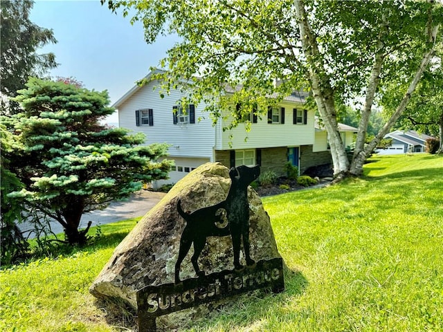 3 Suncrest Ter, Oneonta-City, NY 13820 - view of front of house with a front yard and an attached garage