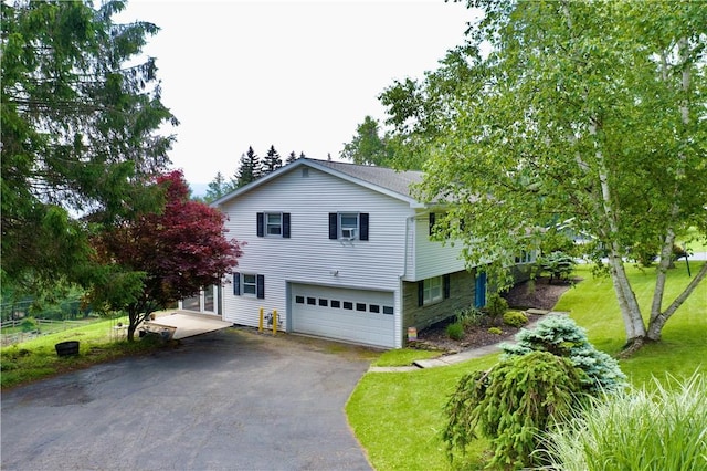 3 Suncrest Ter, Oneonta-City, NY 13820 - view of side of property featuring driveway, an attached garage, and a lawn
