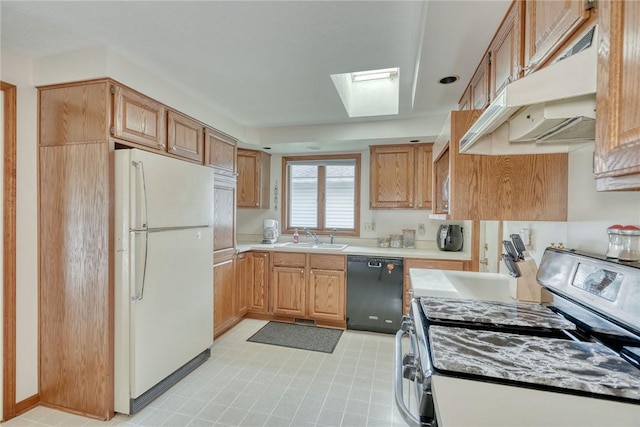 26 Catalina Dr, Irondequoit, NY 14622 - kitchen with freestanding refrigerator, stainless steel electric range, black dishwasher, under cabinet range hood, and light countertops