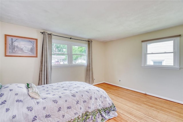 26 Catalina Dr, Irondequoit, NY 14622 - bedroom featuring wood finished floors and baseboards