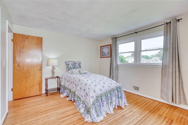 26 Catalina Dr, Irondequoit, NY 14622 - bedroom featuring wood finished floors and baseboards