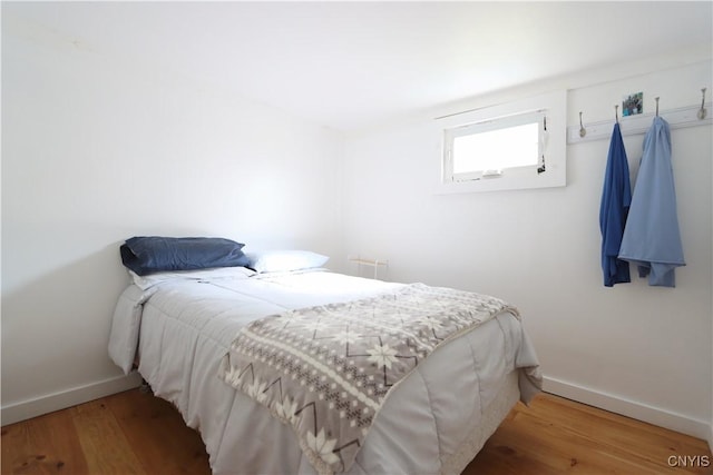 11713 Rays Bay Rd, Henderson, NY 13650 - bedroom with wood finished floors