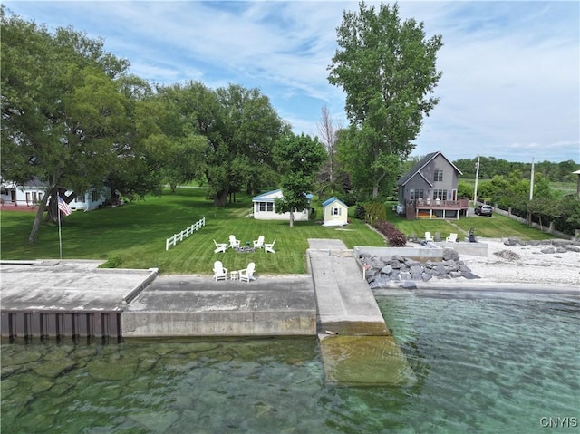 11713 Rays Bay Rd, Henderson, NY 13650 - dock area featuring a boat ramp, a lawn, and a water view