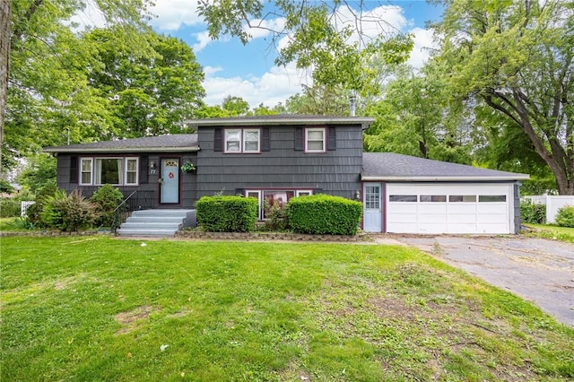 77 Chad Cir, Greece, NY 14616 - split level home featuring asphalt driveway and an attached garage