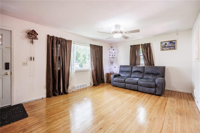 77 Chad Cir, Greece, NY 14616 - living area featuring light wood-type flooring and ceiling fan