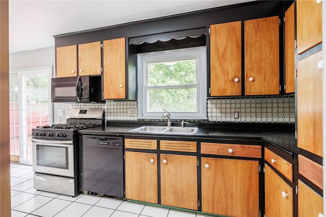 77 Chad Cir, Greece, NY 14616 - kitchen featuring black appliances, dark countertops, and decorative backsplash
