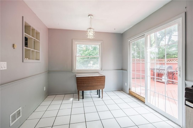 77 Chad Cir, Greece, NY 14616 - unfurnished dining area featuring baseboards