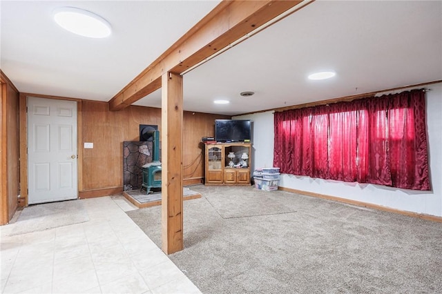77 Chad Cir, Greece, NY 14616 - living room with a wood stove and wood walls