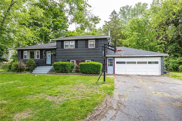 77 Chad Cir, Greece, NY 14616 - tri-level home featuring a front lawn, driveway, and an attached garage