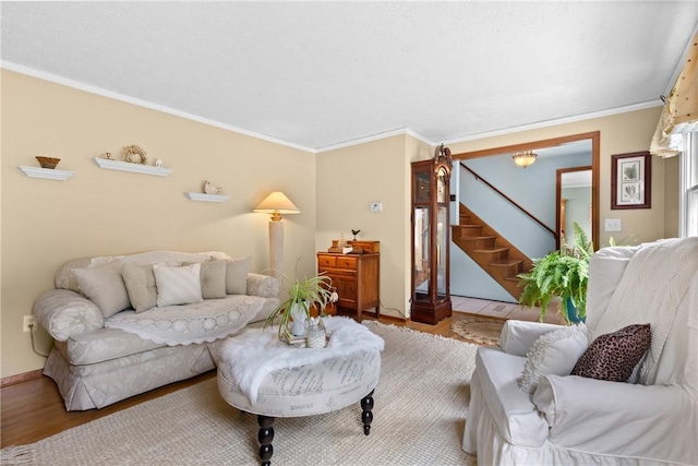 133 Parklands Dr, Greece, NY 14616 - living room featuring stairway, wood finished floors, and ornamental molding
