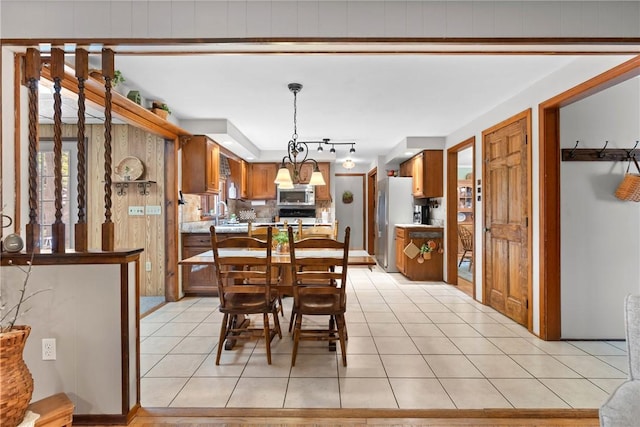 133 Parklands Dr, Greece, NY 14616 - dining room with light tile patterned floors