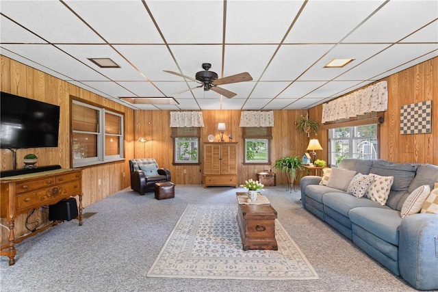 133 Parklands Dr, Greece, NY 14616 - carpeted living area with ceiling fan, wooden walls, and a paneled ceiling