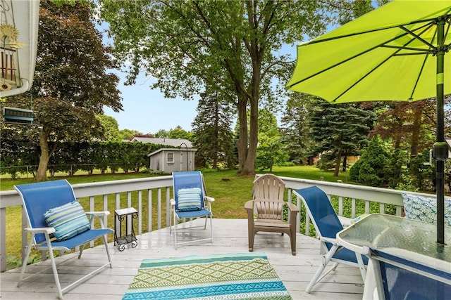 133 Parklands Dr, Greece, NY 14616 - wooden deck with a storage unit and a yard