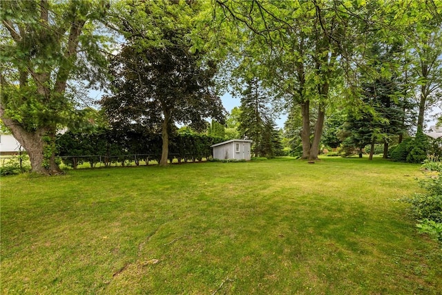 133 Parklands Dr, Greece, NY 14616 - view of green lawn with a storage unit