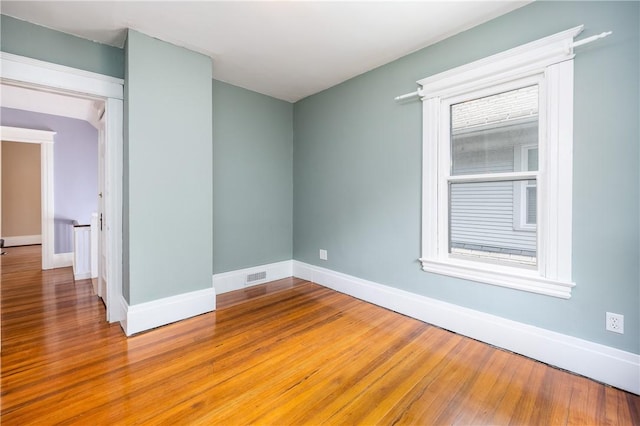 34 Shepard St, Rochester, NY 14620 - spare room featuring wood finished floors and baseboards