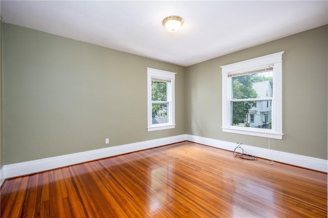 34 Shepard St, Rochester, NY 14620 - empty room with baseboards and wood finished floors
