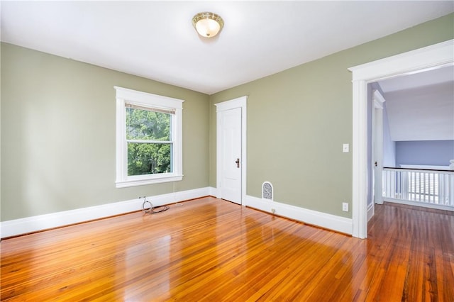 34 Shepard St, Rochester, NY 14620 - spare room with wood-type flooring and baseboards