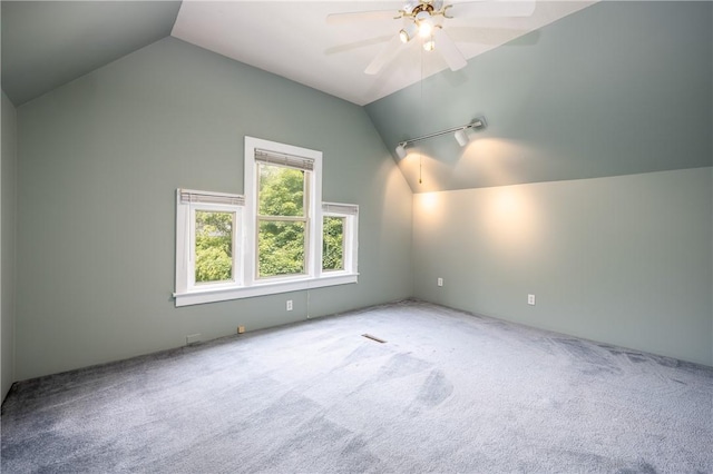 34 Shepard St, Rochester, NY 14620 - additional living space with vaulted ceiling, carpet floors, and a ceiling fan