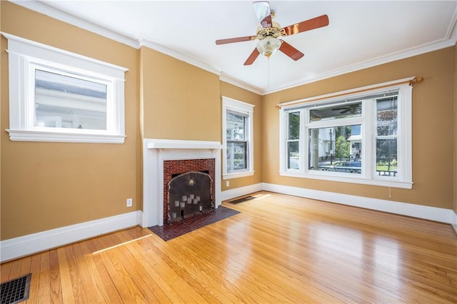 34 Shepard St, Rochester, NY 14620 - unfurnished living room featuring light wood-style floors, a fireplace with flush hearth, a ceiling fan, and ornamental molding