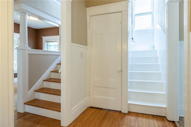 34 Shepard St, Rochester, NY 14620 - stairway featuring wood finished floors and decorative columns