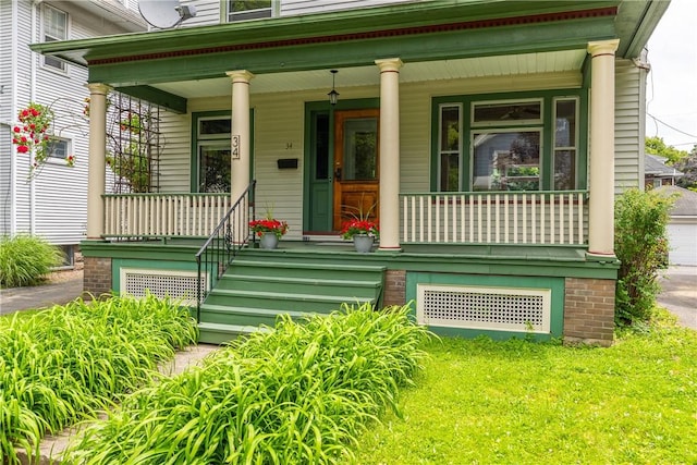 34 Shepard St, Rochester, NY 14620 - doorway to property with a porch and a garage