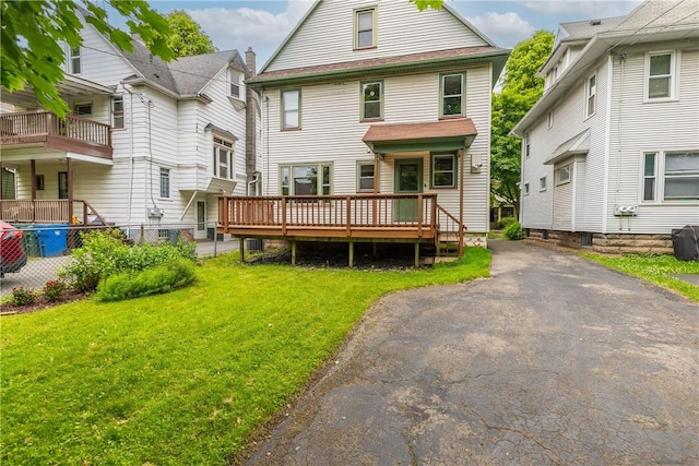 34 Shepard St, Rochester, NY 14620 - rear view of house with a wooden deck