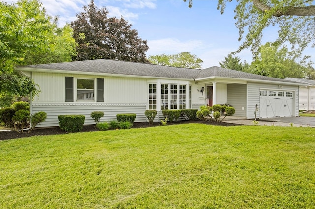 38 Moroa Dr, Irondequoit, NY 14622 - ranch-style house featuring an attached garage, a front lawn, and concrete driveway