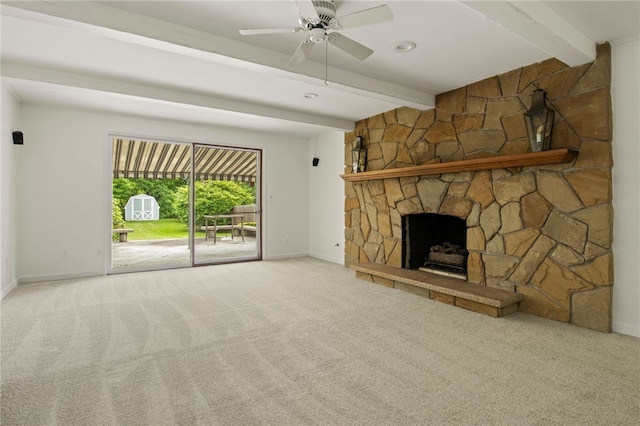 38 Moroa Dr, Irondequoit, NY 14622 - unfurnished living room with beamed ceiling, carpet flooring, a stone fireplace, a ceiling fan, and recessed lighting