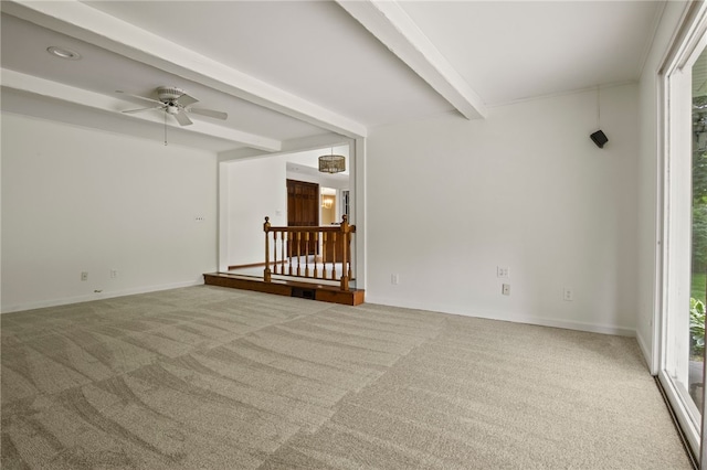 38 Moroa Dr, Irondequoit, NY 14622 - carpeted empty room featuring beamed ceiling and ceiling fan