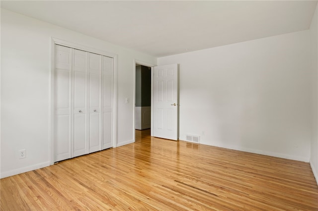 38 Moroa Dr, Irondequoit, NY 14622 - unfurnished bedroom with light wood-type flooring and a closet