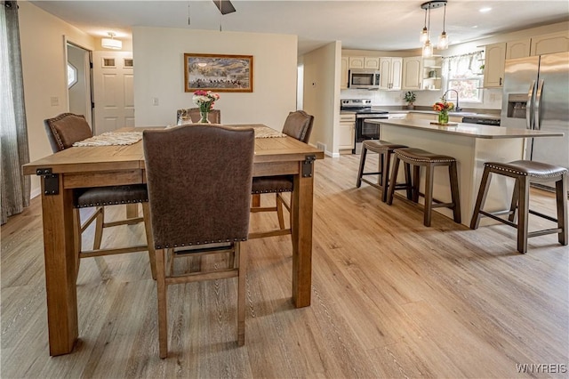 1558 Youngstown Wilson Rd, Porter, NY 14174 - dining room featuring light wood-style floors