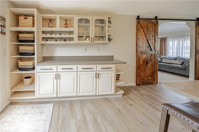 1558 Youngstown Wilson Rd, Porter, NY 14174 - bar featuring light wood-style flooring and a barn door