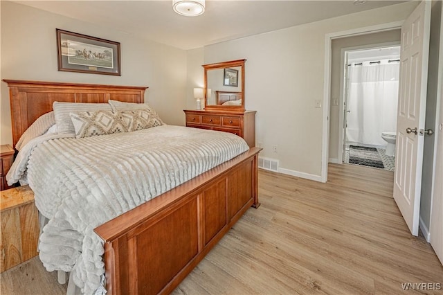 1558 Youngstown Wilson Rd, Porter, NY 14174 - bedroom featuring light wood-style flooring and baseboards