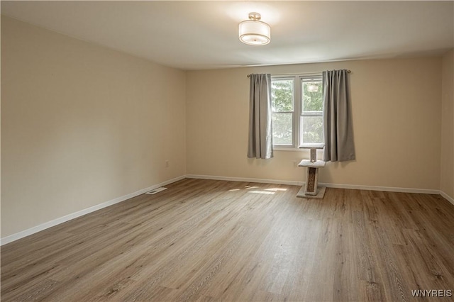 1558 Youngstown Wilson Rd, Porter, NY 14174 - spare room with wood finished floors and baseboards