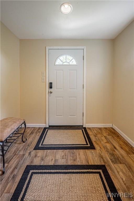 1558 Youngstown Wilson Rd, Porter, NY 14174 - foyer entrance with baseboards and wood finished floors