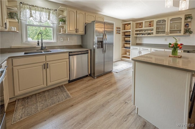 1558 Youngstown Wilson Rd, Porter, NY 14174 - kitchen with open shelves, appliances with stainless steel finishes, and light wood finished floors