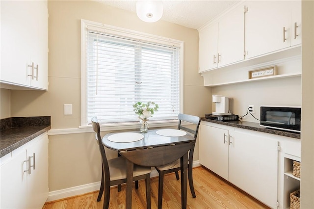 25 Kiniry Dr, Irondequoit, NY 14609 - dining room featuring light wood-type flooring