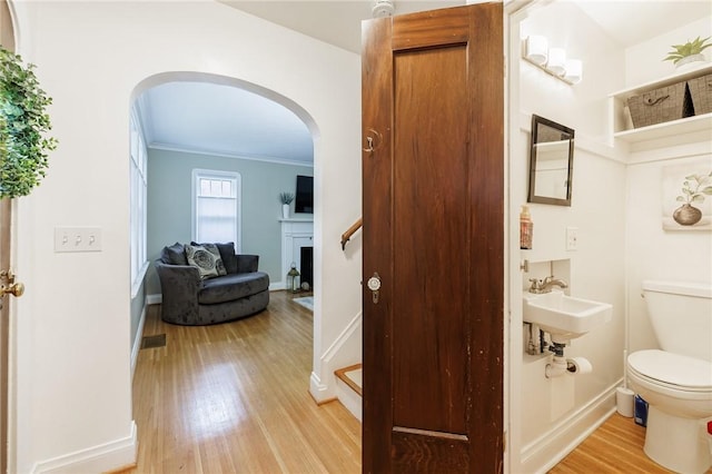 25 Kiniry Dr, Irondequoit, NY 14609 - half bath featuring wood finished floors and crown molding