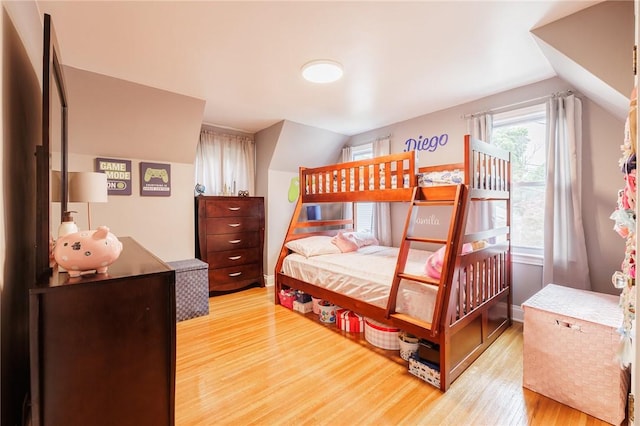 25 Kiniry Dr, Irondequoit, NY 14609 - bedroom featuring wood finished floors and lofted ceiling