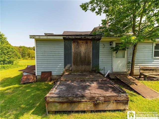 5030 Rte 430, Ellery, NY 14712 - rear view of house featuring a lawn and a wooden deck