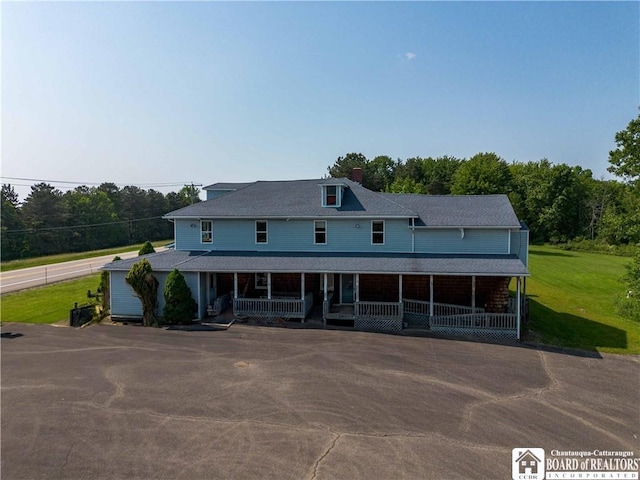 5030 Rte 430, Ellery, NY 14712 - farmhouse with a porch and a front lawn