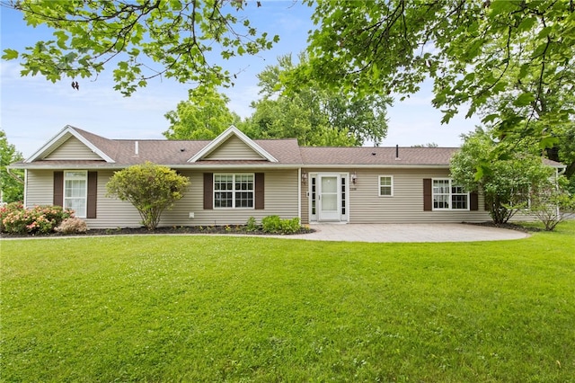1258 State Rd, Webster, NY 14580 - back of property with a patio and a lawn