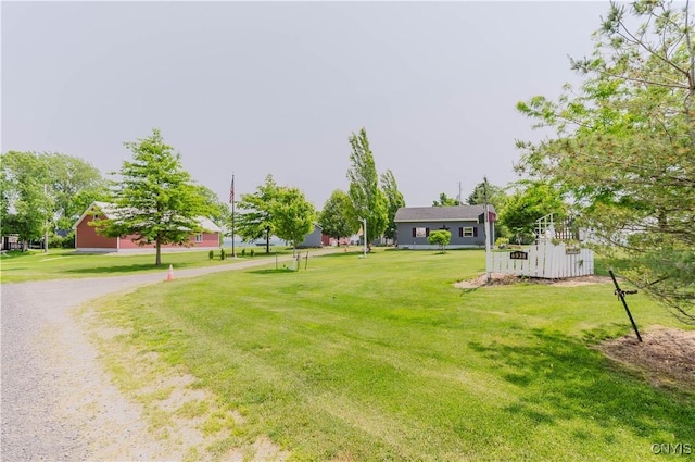 6938 Klock Rd, Lyme, NY 13693 - view of grassy yard with gravel driveway