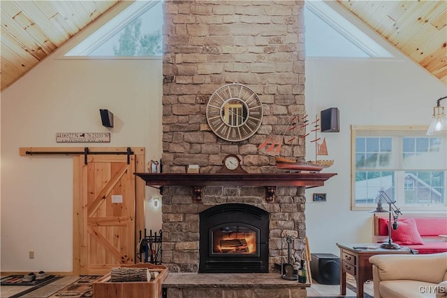 6938 Klock Rd, Lyme, NY 13693 - living room with wood ceiling, a large fireplace, high vaulted ceiling, a barn door, and healthy amount of natural light