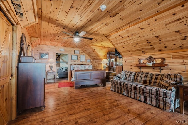 6938 Klock Rd, Lyme, NY 13693 - bedroom featuring wood walls, wood-type flooring, wooden ceiling, and lofted ceiling