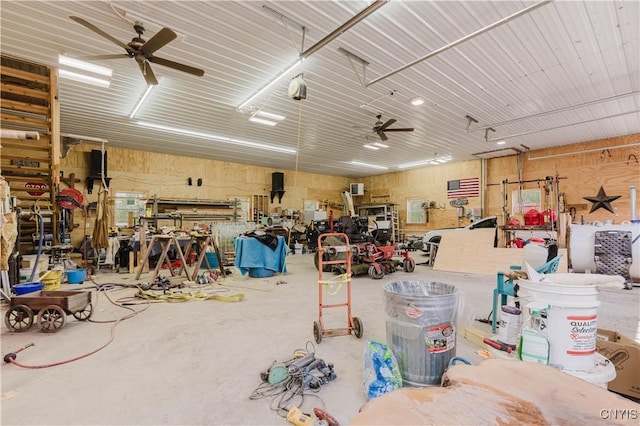 6938 Klock Rd, Lyme, NY 13693 - garage with ceiling fan and a workshop area